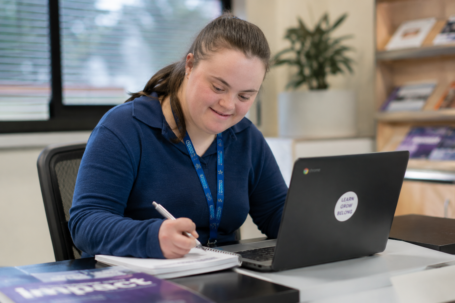 Young person studying happily